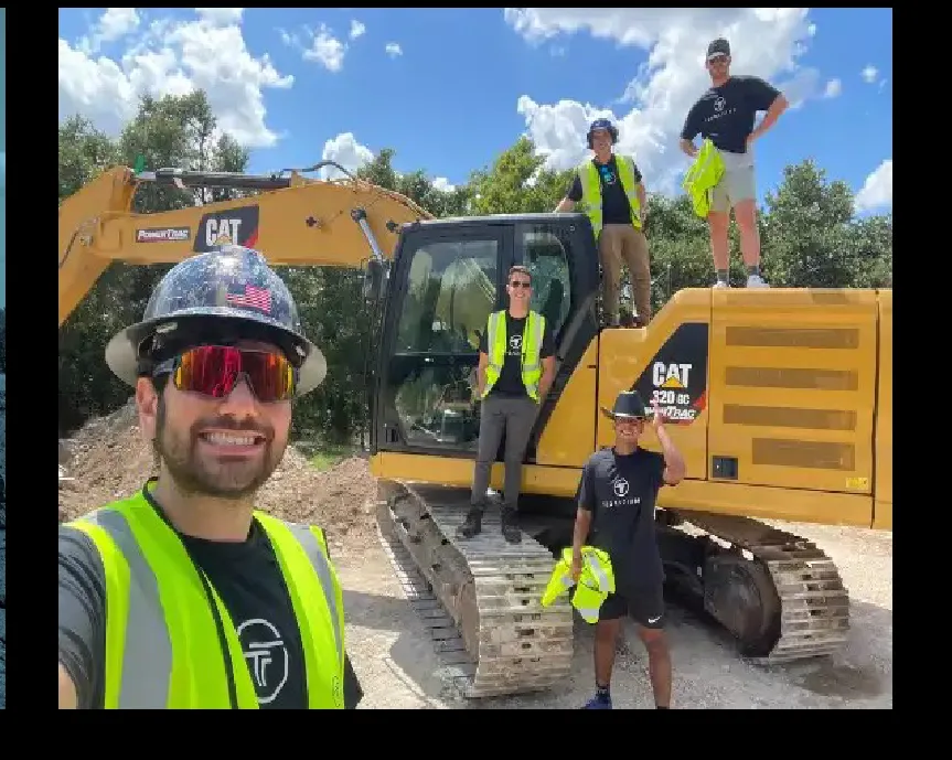 A TerraFirma crew and retrofitted machines on a Central Texas job site.
